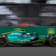 A photo of the green Aston Martin F1 car racing at Silverstone.